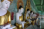 Myanmar - Sagaing, Umin Thounzeh (the 30 Caves), a colourful crescent-shaped colonnade within which there are 45 Buddha images. 